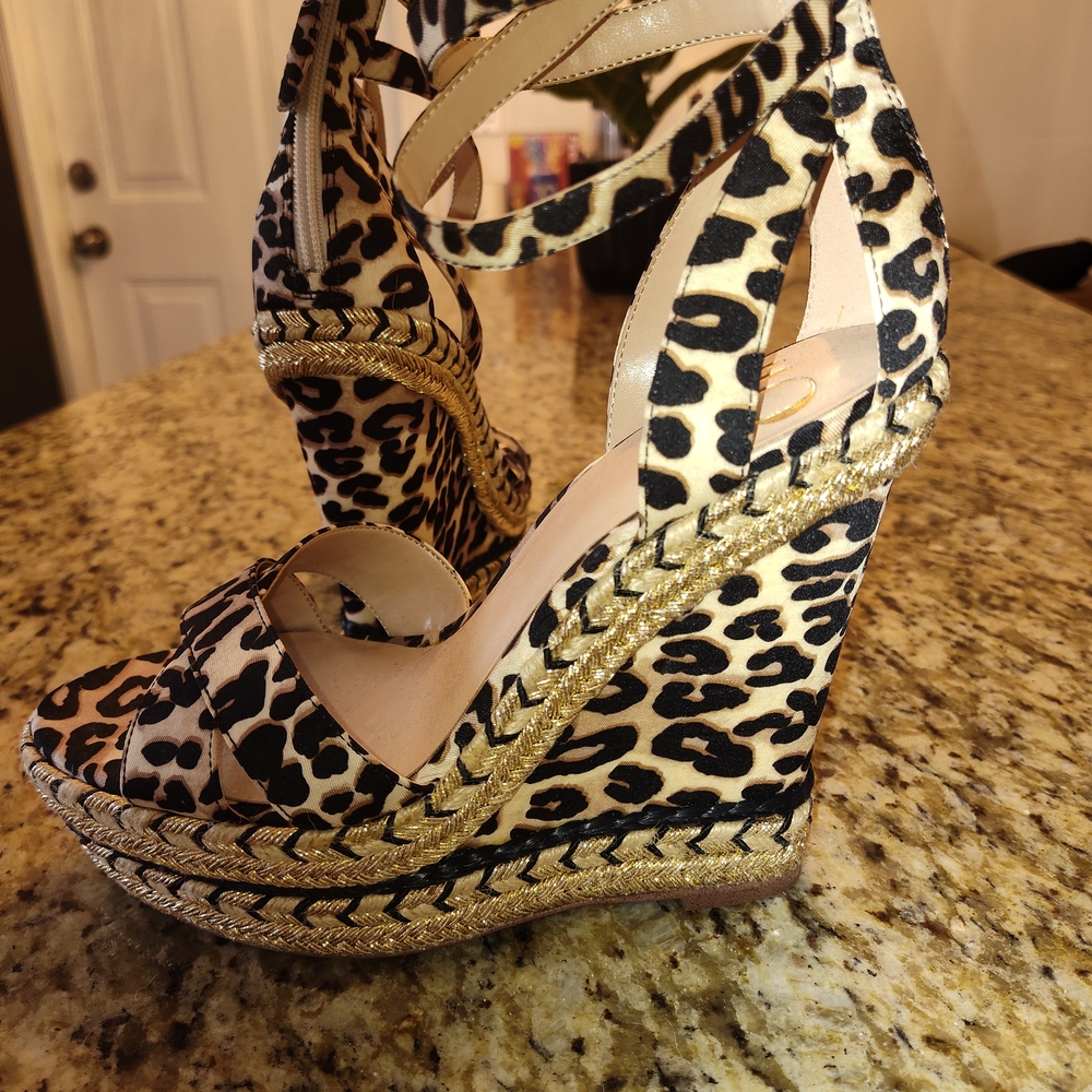 Jennifer Lopez Leopard Print Wedges with Gold Accents